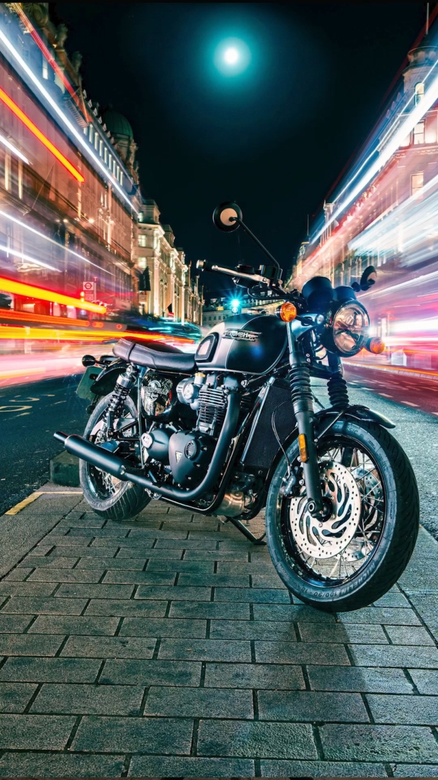 Oli Tennent's Triumph Bonneville T120 surrounded by traffic in a night long exposure photo