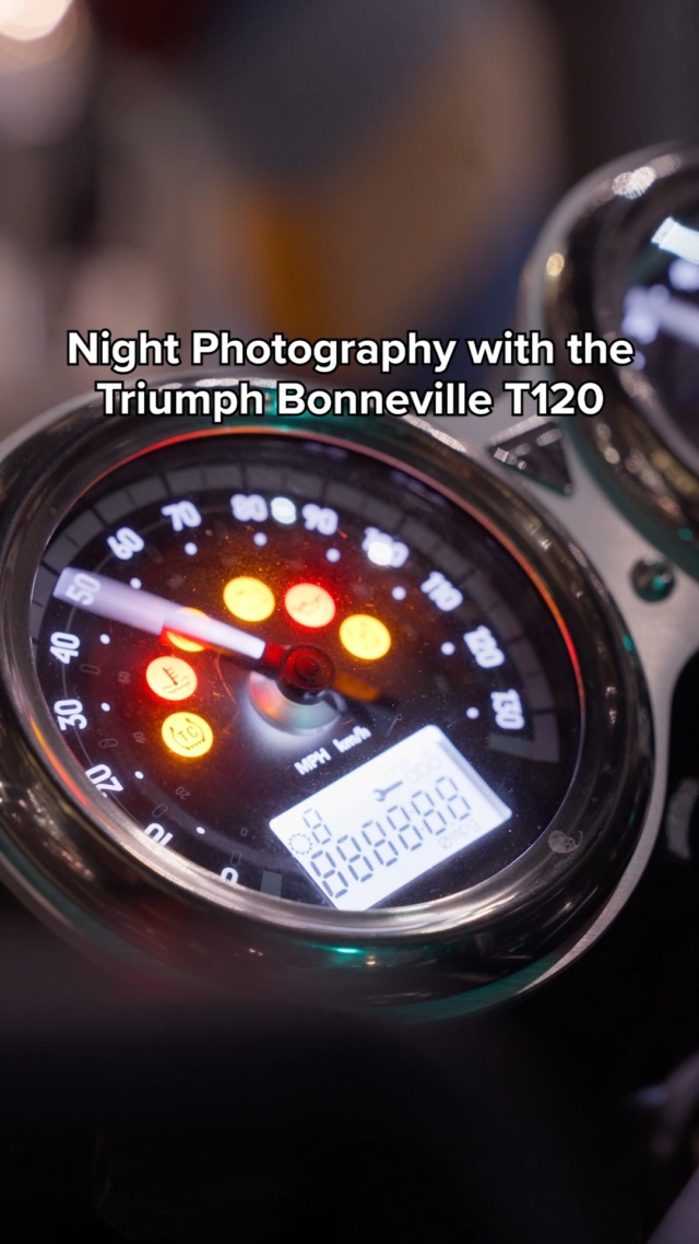 A speedometer on a motorcycle with the caption 'Night Photography with the Triumph Bonneville T120'