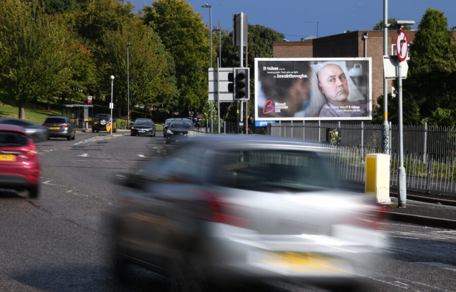 An image of a Blood Cancer UK advert being displayed outside