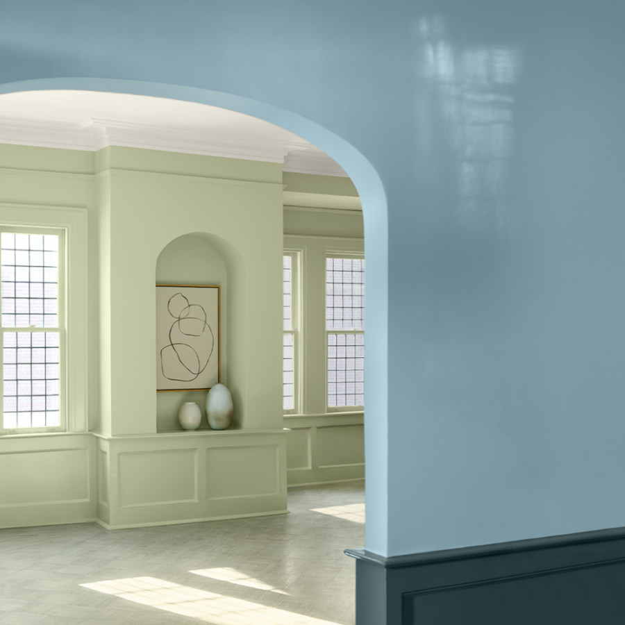 A living room is painted green and blue with Benjamin Moore paints