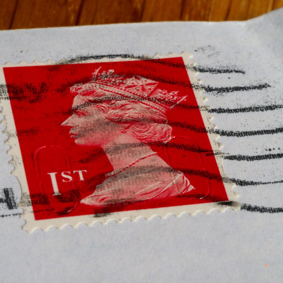 A close up of a postmarked